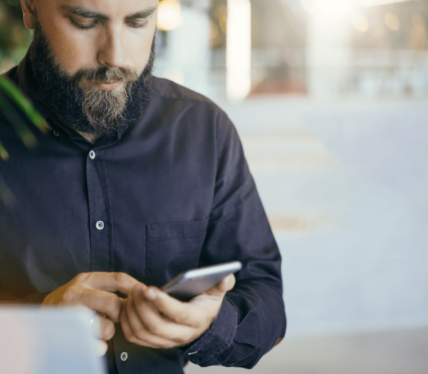A member reading on their mobile